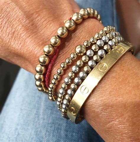 cartier bracelet stack in style.